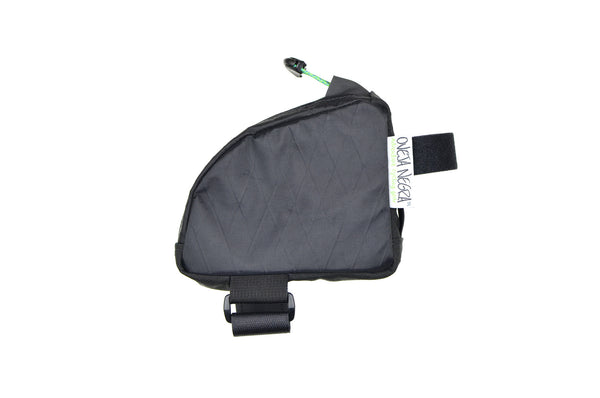 Oveja Negra's smallest top tube bicycle bag, the Snack Pack, is built to be ultra stable and provide one-handed access while in the bike saddle.