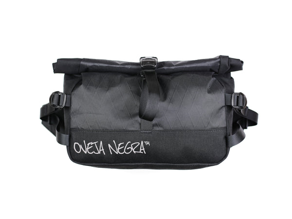 The Royale™ is Oveja Negra's rendition of an enduro hip pack, fanny pack, bumbag, or whatever you like to call it, featuring a simple roll-top closure, an interior zippered pocket and side compressions straps