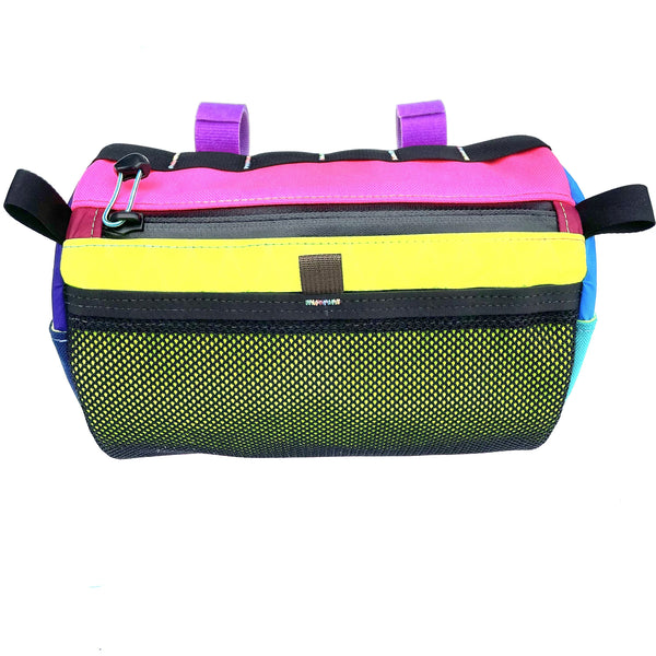 The 925 bike handlebar bag is sewn in one-of-a-kind random color combos is removable/wearable.